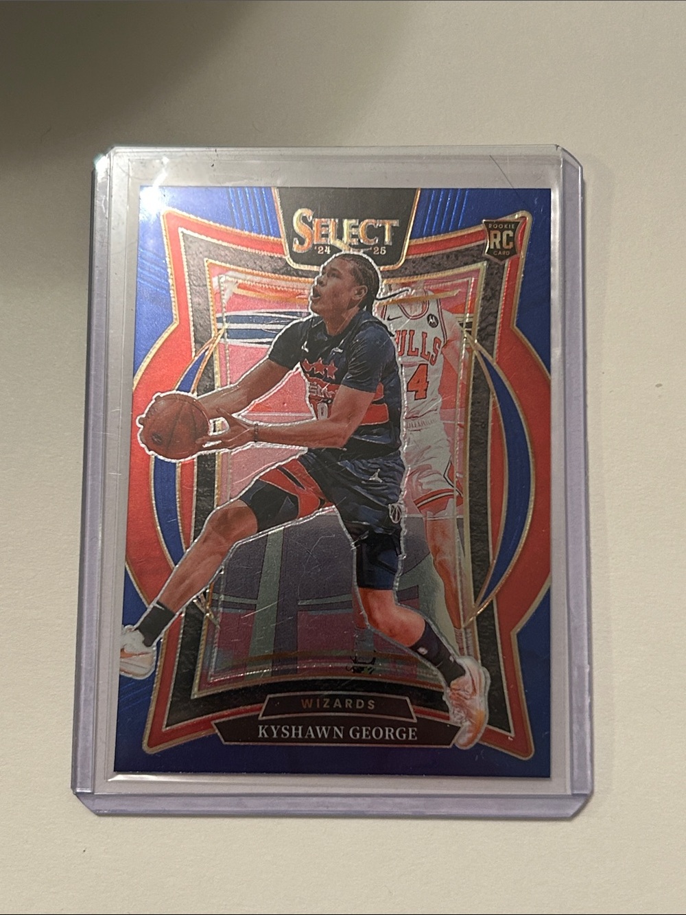 Select Kyshawn George Rookie Trading Card - Blue & Red